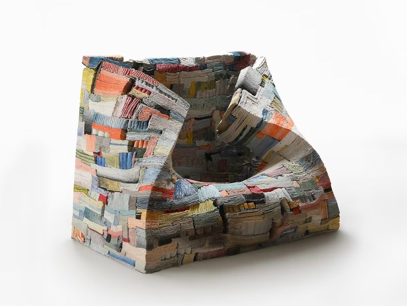 Jongjin Park, a slumped wedge of layered, striated porcelain that reads as stacked cloth or sedimentary rock